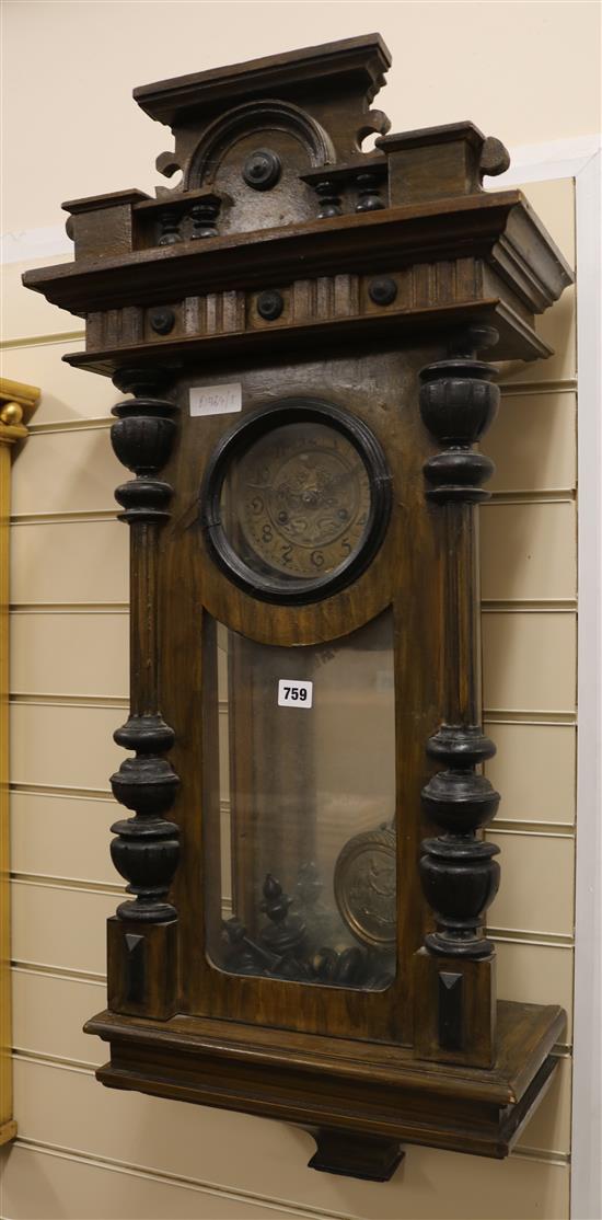 A German walnut cased wall clock, and a Junghans oak cased wall clock,